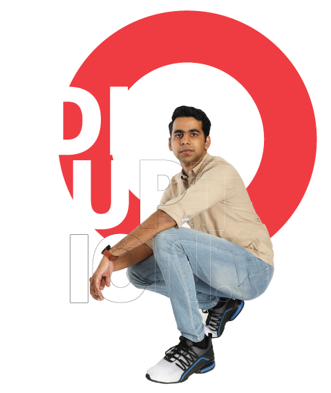 A man kneeling in front of a graphic that reads, "disruption"